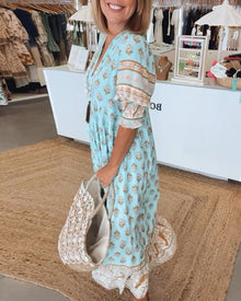 Giulia - midi dress with v-neck and elegant balloon sleeves