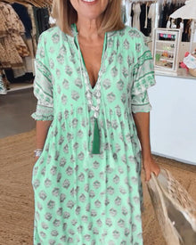 Giulia - midi dress with v-neck and elegant balloon sleeves