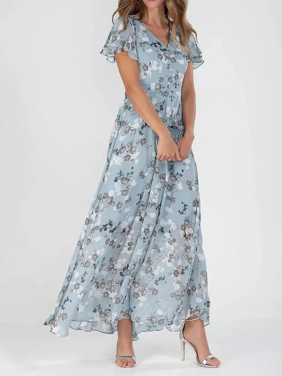 Elegancka sukienka damska midi o podkreślającym figurę fasonie