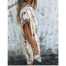 Emily - loose-fit printed short sleeve dress with pockets
